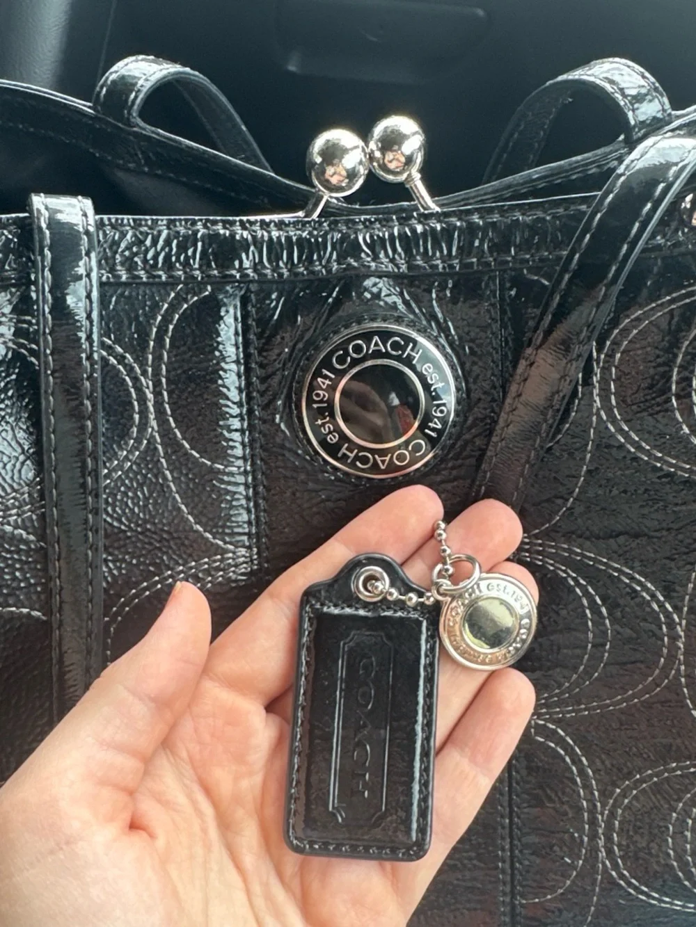 Coach black kiss lock purse
